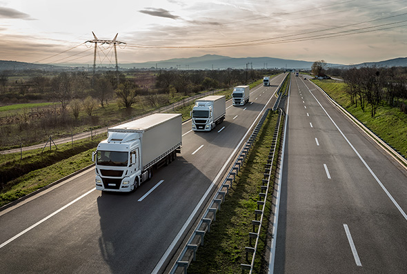 Events_Transportation Trucks on a Highway